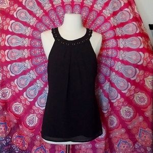 Calvin Klein black with gold rings halter style blouse. Like new